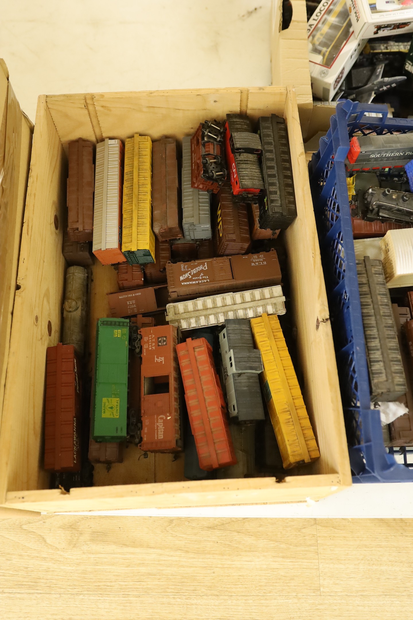 A large collection of 00 gauge toy locomotives and rolling stock